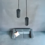 Pendente cilíndrico longo de concreto preto